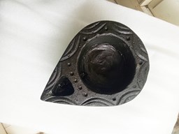 Picture of Natural Black Stone Lamp: Elegant Home Decor Weighing 3 kg.